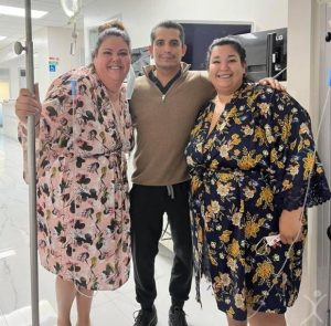 Dr. Christian Rodriguez Lopez with two patients